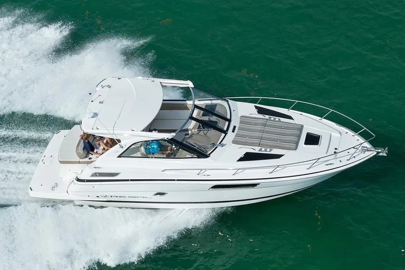Popsicle Yacht Photos Pics 2019 Regal 35 Sport Coupe cruising on open water.