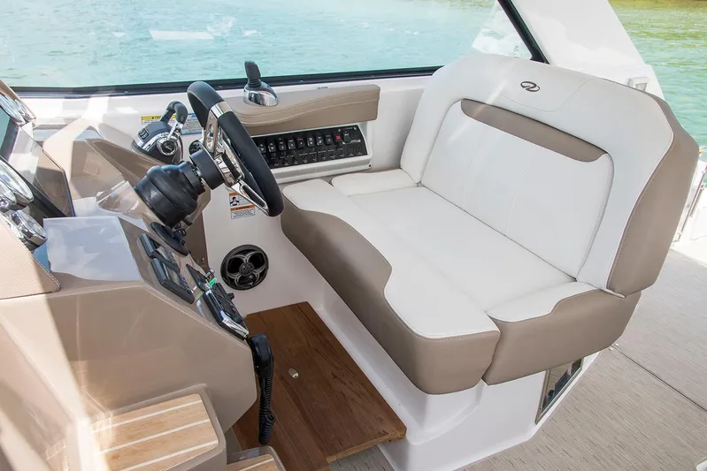 Popsicle Yacht Photos Pics 2019 Regal 35 Sport Coupe helm seat and dashboard.