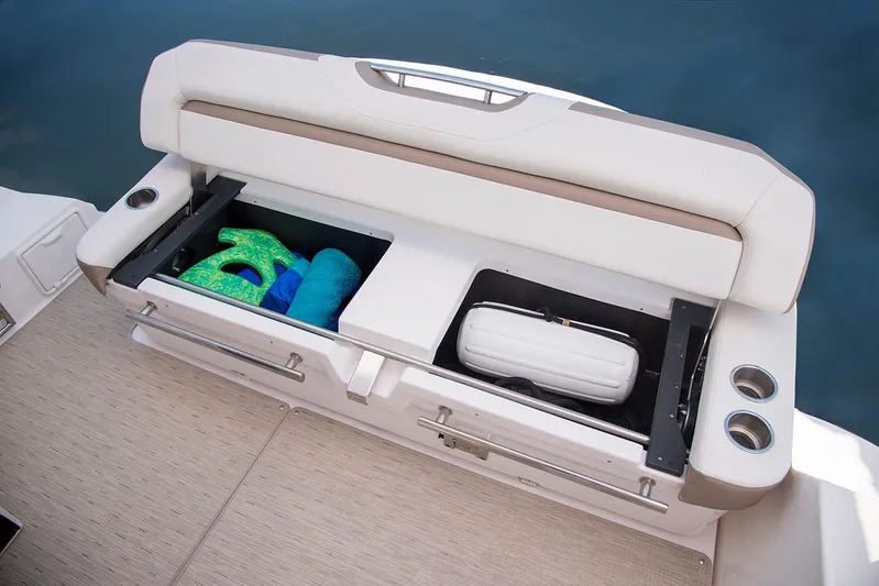 Popsicle Yacht Photos Pics 2019 Regal 35 Sport Coupe boat with open storage compartments on deck.