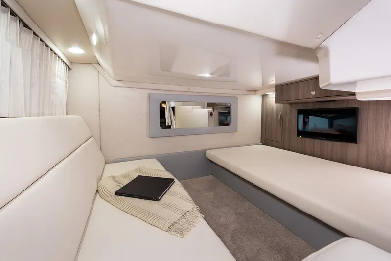 Popsicle Yacht Photos Pics 2019 Regal 35 Sport Coupe interior cabin with modern furnishings.