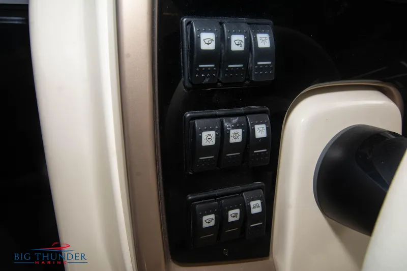  Yacht Photos Pics Control panel of 2024 Invictus TT280S boat with various switches.