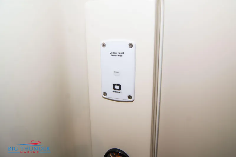  Yacht Photos Pics Control panel for electric toilets on 2024 Invictus TT280S boat.