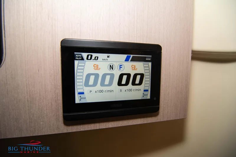  Yacht Photos Pics Dashboard display of 2024 Invictus TT280S boat, featuring autopilot and speedometer.