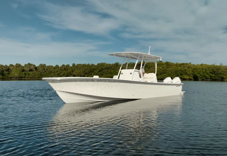 New Build Yacht Photos Pics 2024 Birdsall 30 boat on calm water with forested shoreline in the background.