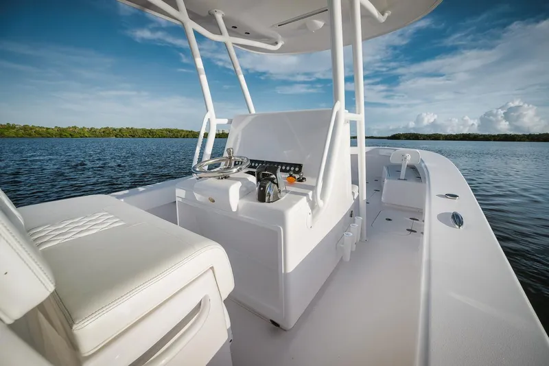 New Build Yacht Photos Pics 2024 Birdsall 30 boat interior with steering console on calm water.