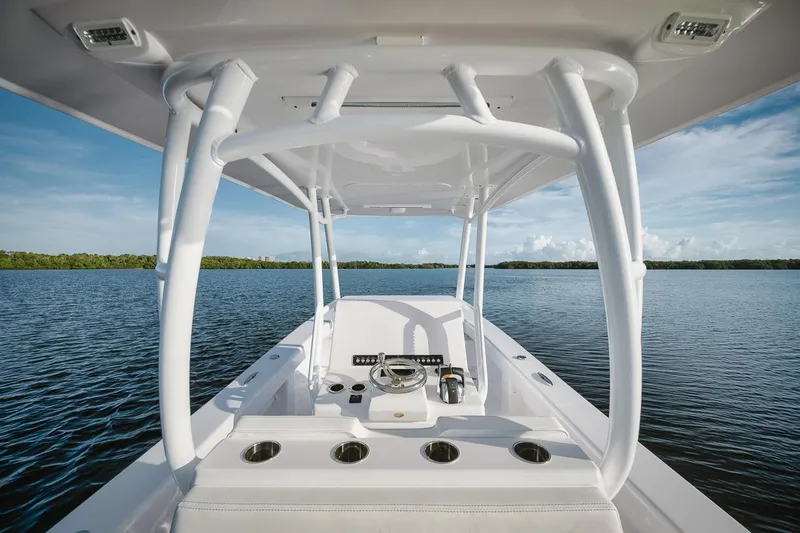 New Build Yacht Photos Pics 2024 Birdsall 30 boat interior with steering console on calm water.