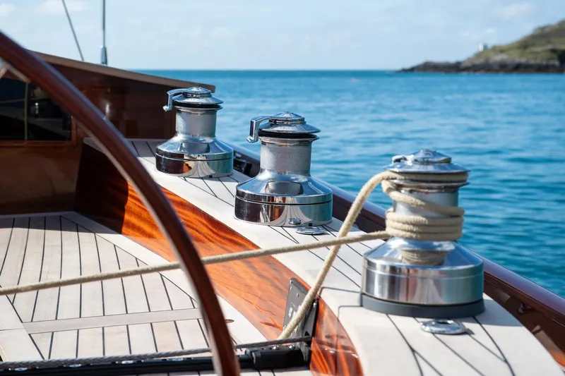 Gwenhyfar II Yacht Photos Pics Deck of 2023 Spirit Yachts C72 with winches and ropes, overlooking the ocean.