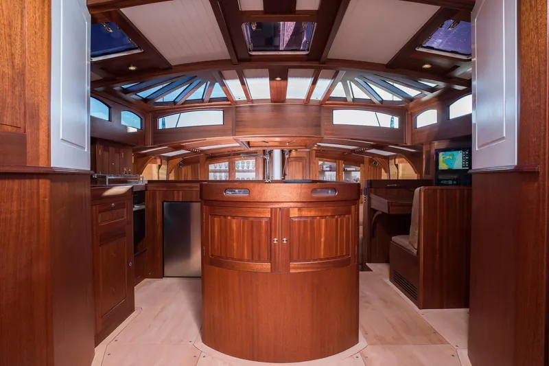 Gwenhyfar II Yacht Photos Pics Luxurious interior of 2023 Spirit Yachts C72, featuring elegant wood finishes and modern design.