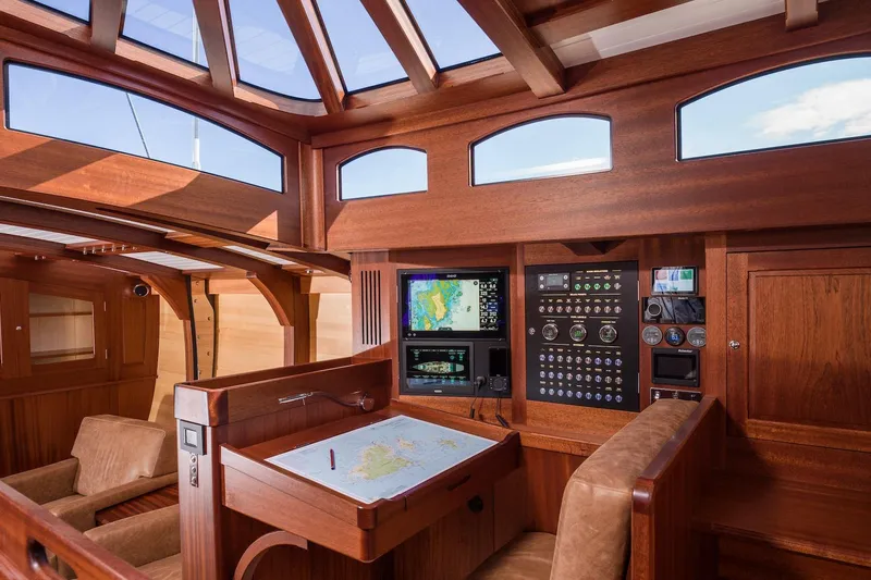 Gwenhyfar II Yacht Photos Pics Luxurious 2023 Spirit Yachts C72 interior with navigation station and wooden finish.