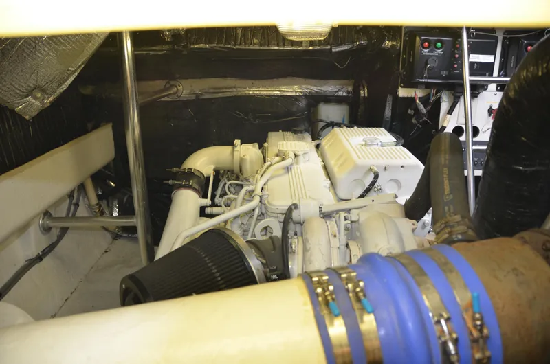 Double Trouble Yacht Photos Pics Engine room of 1992 Tiara Yachts 43 Open, showcasing mechanical components and systems.