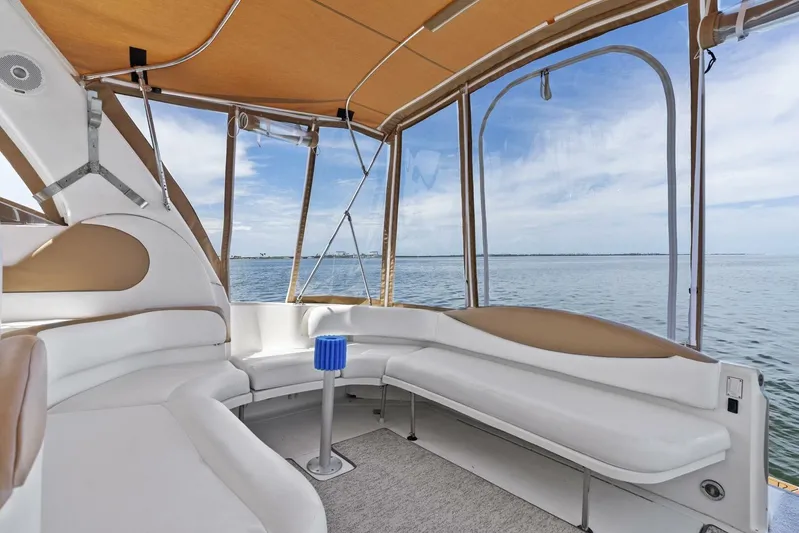  Yacht Photos Pics 2001 Sea Ray 380 Sundancer interior with white seating and ocean view.