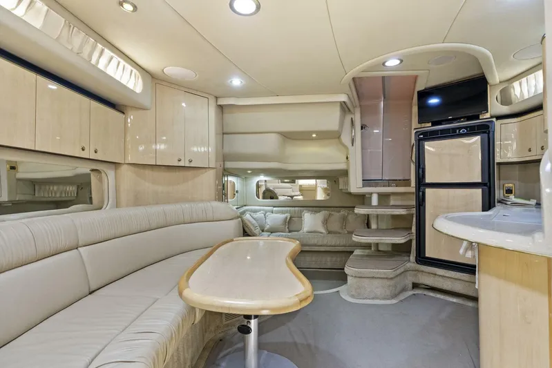  Yacht Photos Pics Luxurious interior of 2001 Sea Ray 380 Sundancer yacht with elegant seating and modern amenities.