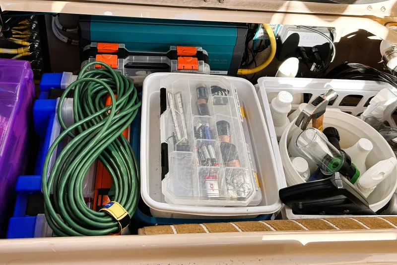 Serafina Yacht Photos Pics Storage compartment on a 2019 Ranger Tugs R-29 CB with tools and supplies.