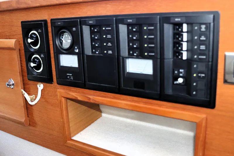 Serafina Yacht Photos Pics Control panel of 2019 Ranger Tugs R-29 CB boat, featuring switches and gauges.
