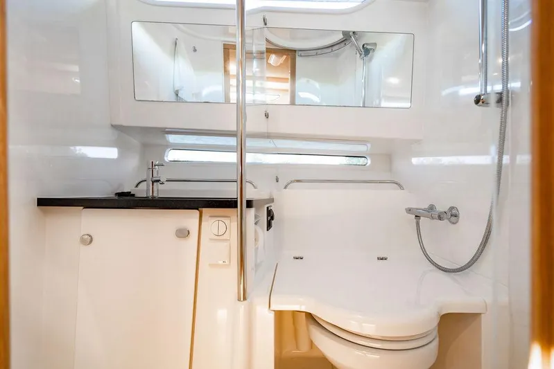 Volare Yacht Photos Pics Modern bathroom interior in 2023 Nimbus T11 yacht, featuring sleek design and fixtures.