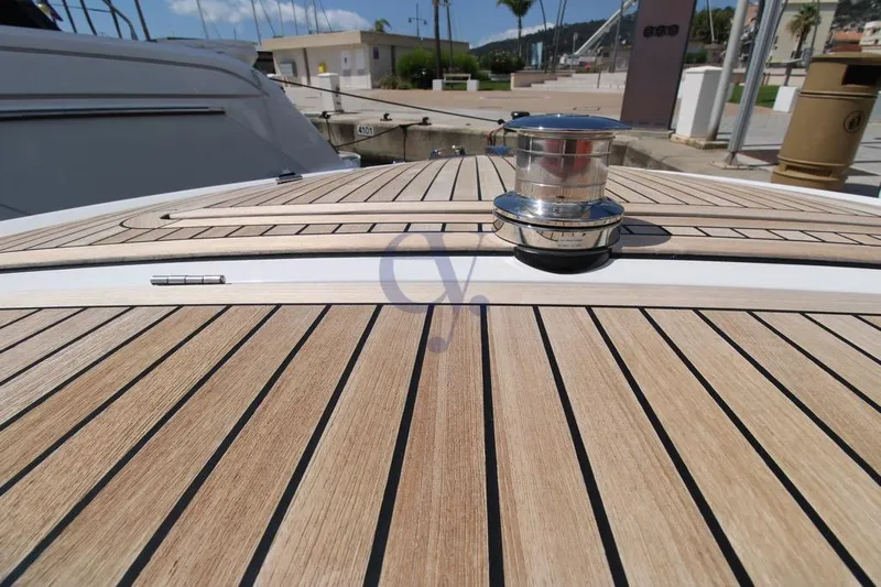 S Yacht Photos Pics 2024 Frauscher 1414 Demon Air yacht deck with sleek wood finish and chrome details.