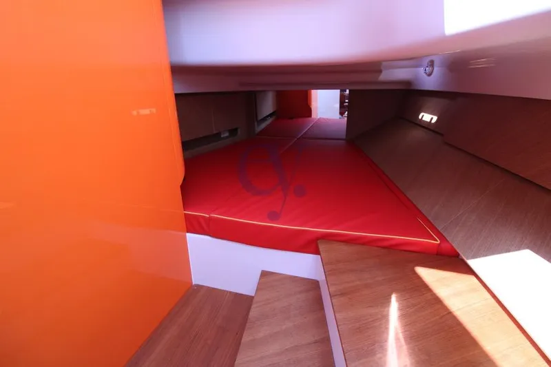 S Yacht Photos Pics 2024 Frauscher 1414 Demon Air interior with red seating and wooden accents.