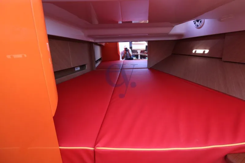 S Yacht Photos Pics Interior cabin of 2024 Frauscher 1414 Demon Air with red upholstery.
