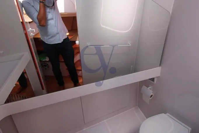 S Yacht Photos Pics Bathroom interior of 2024 Frauscher 1414 Demon Air yacht, featuring modern design elements.