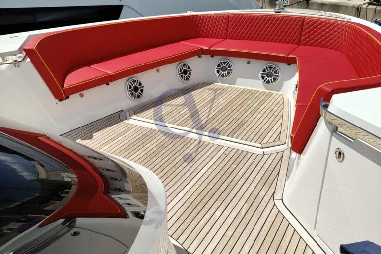 S Yacht Photos Pics Luxury seating area on 2024 Frauscher 1414 Demon Air yacht with red cushions.
