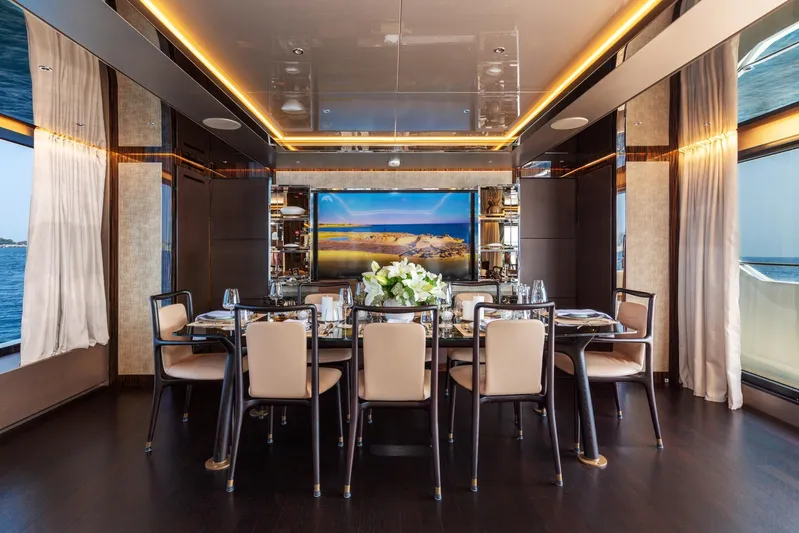 Nangara Yacht Photos Pics Luxurious dining area on 2024 Sanlorenzo SL 106 Asymmetric yacht, featuring elegant decor and ocean views.