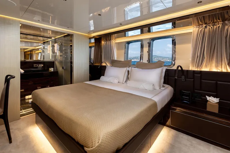 Nangara Yacht Photos Pics Luxurious bedroom interior of 2024 Sanlorenzo SL 106 Asymmetric yacht with ocean view.