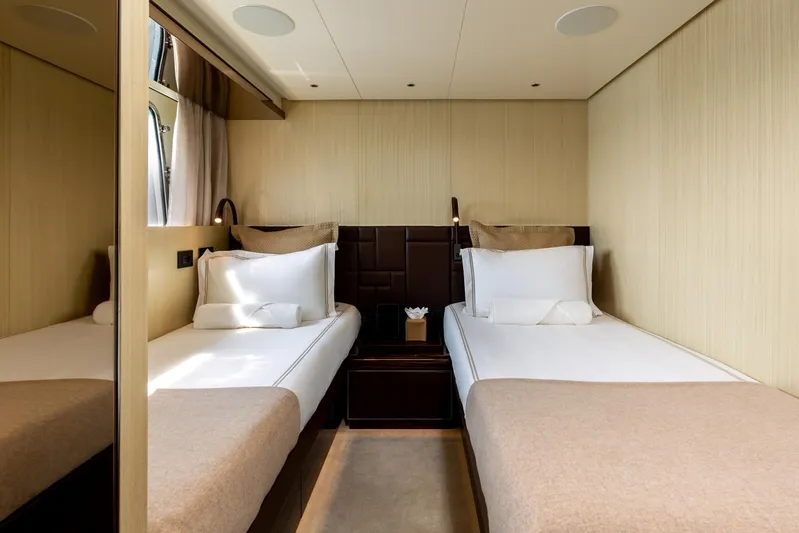 Nangara Yacht Photos Pics Luxurious twin cabin in 2024 Sanlorenzo SL 106 Asymmetric yacht, featuring elegant design and comfort.