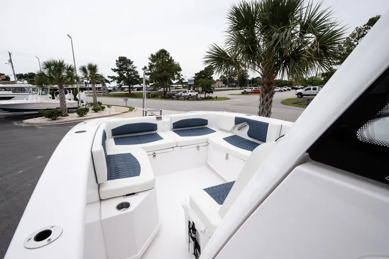  Yacht Photos Pics 2025 Twin Vee 260 GFX2 CC boat with spacious seating and modern design.