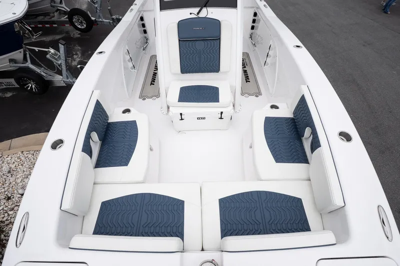  Yacht Photos Pics 2025 Twin Vee 260 GFX2 CC boat interior with blue and white seating.