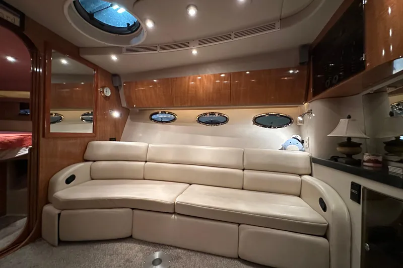 .38 Special Yacht Photos Pics Luxurious interior of 2004 Regal Commodore 3860 yacht with plush seating and elegant lighting.