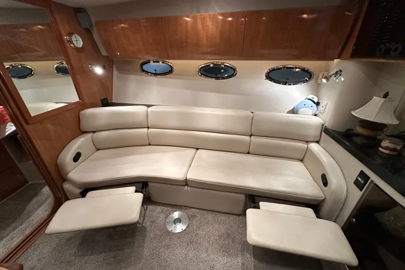 .38 Special Yacht Photos Pics Luxurious interior of 2004 Regal Commodore 3860 yacht with plush seating and elegant decor.