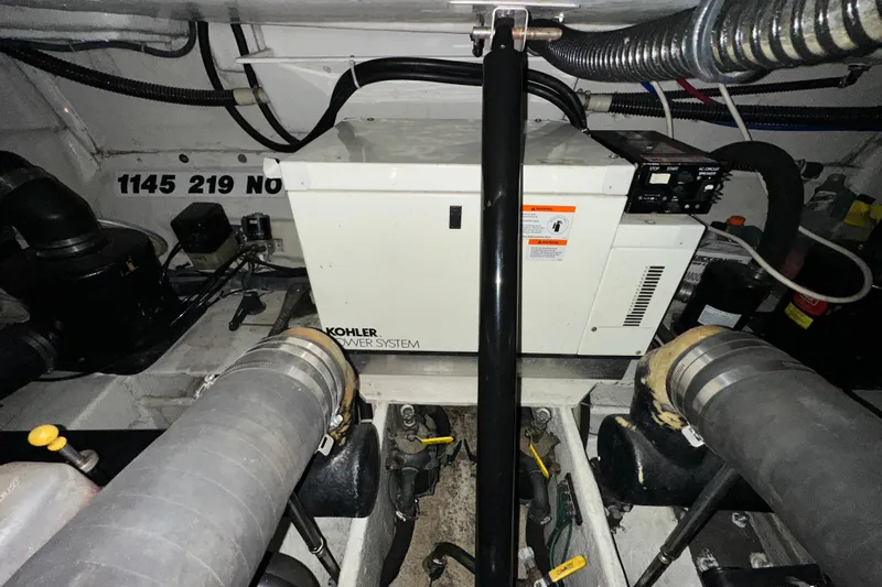 .38 Special Yacht Photos Pics Engine room of 2004 Regal Commodore 3860 with Kohler power system.