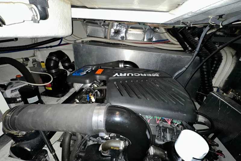 .38 Special Yacht Photos Pics Engine compartment of 2004 Regal Commodore 3860 with Mercury engine components.