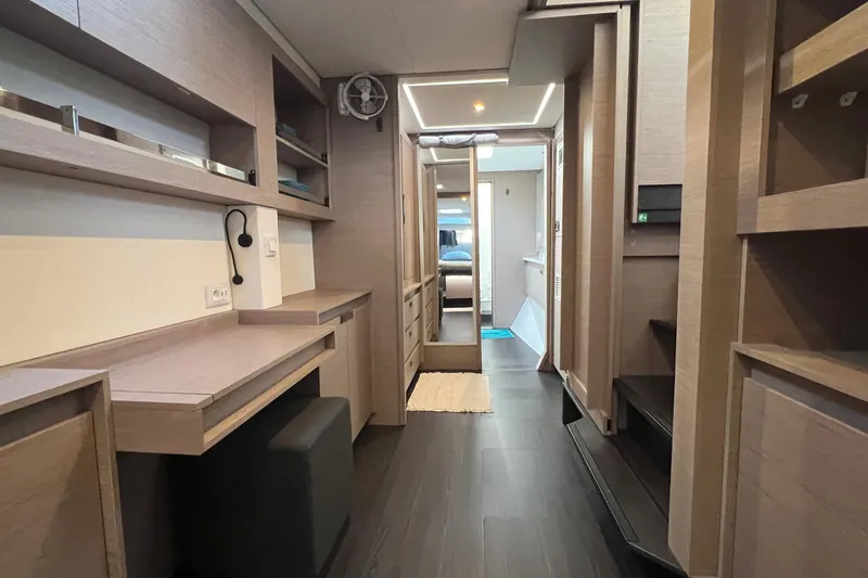 Aria Yacht Photos Pics Modern interior of 2023 Fountaine Pajot Elba 45 Catamaran with sleek wood finishes.