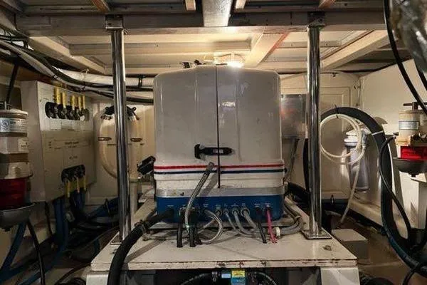 Shearwater Yacht Photos Pics Engine room of 2000 Grand Banks 36 Classic yacht with visible machinery and wiring.