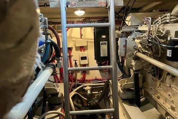 Shearwater Yacht Photos Pics Engine room of 2000 Grand Banks 36 Classic with visible machinery and ladder.