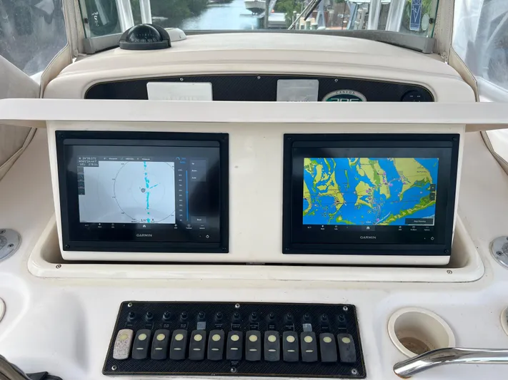  Yacht Photos Pics Grady-White Canyon 306 2011 boat dashboard with dual Garmin navigation screens.