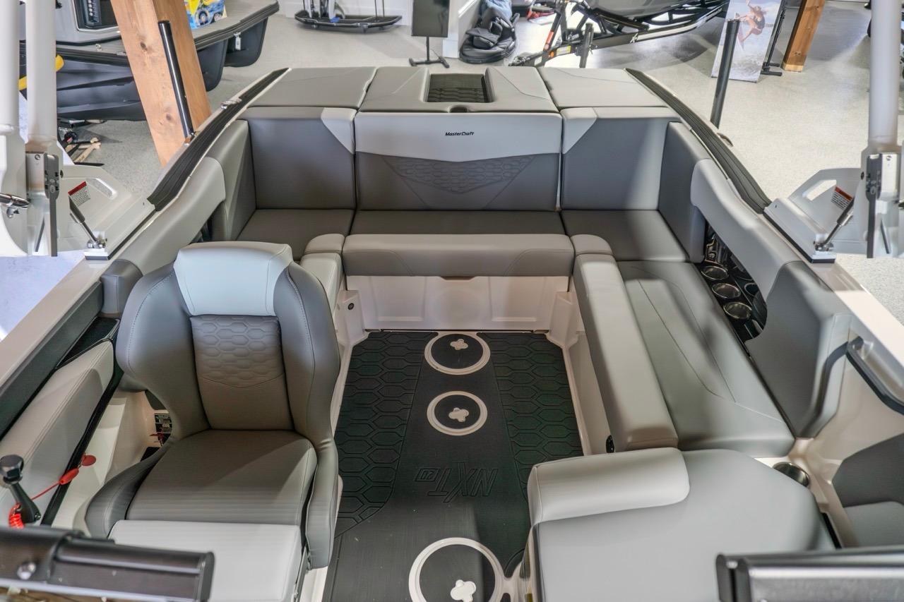 2026 MasterCraft NXT20 boat interior with gray seating and modern design.