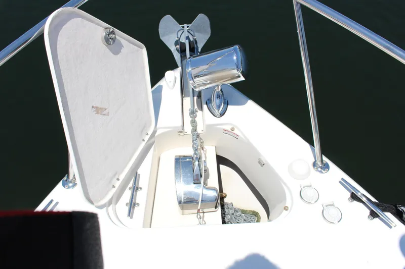 Happy Ours Yacht Photos Pics 2008 Chaparral 350 Signature boat anchor and chain compartment.