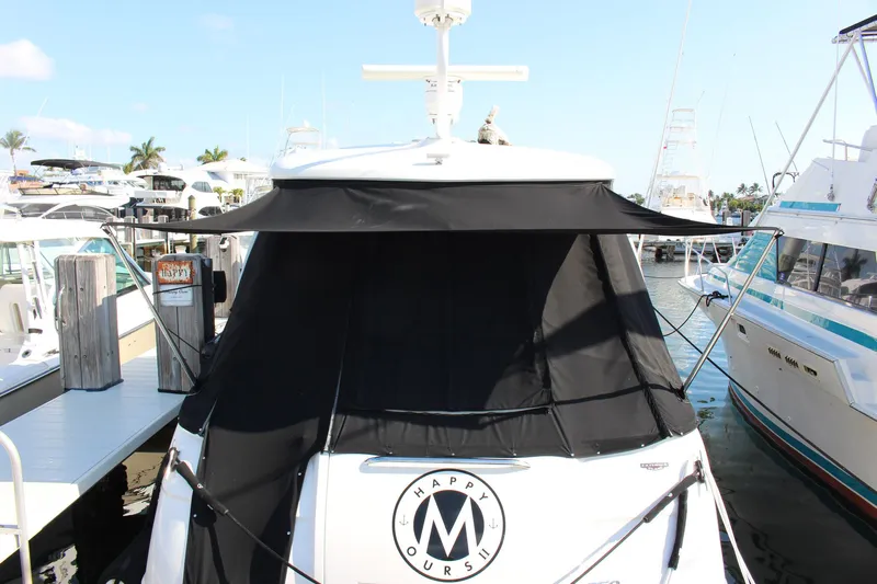 Happy Ours Yacht Photos Pics 2008 Chaparral 350 Signature Extended Plane yacht docked with black cover.