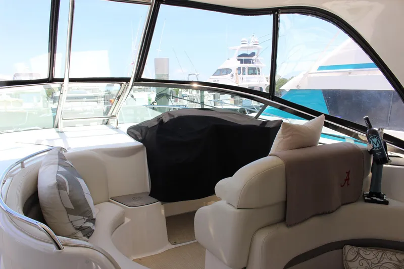 Happy Ours Yacht Photos Pics 2008 Chaparral 350 Signature yacht interior with plush seating and marina view.