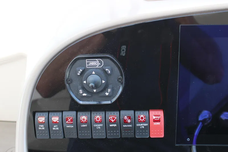 Happy Ours Yacht Photos Pics Control panel of 2008 Chaparral 350 Signature Extended Plane with switches and Jabsco control.