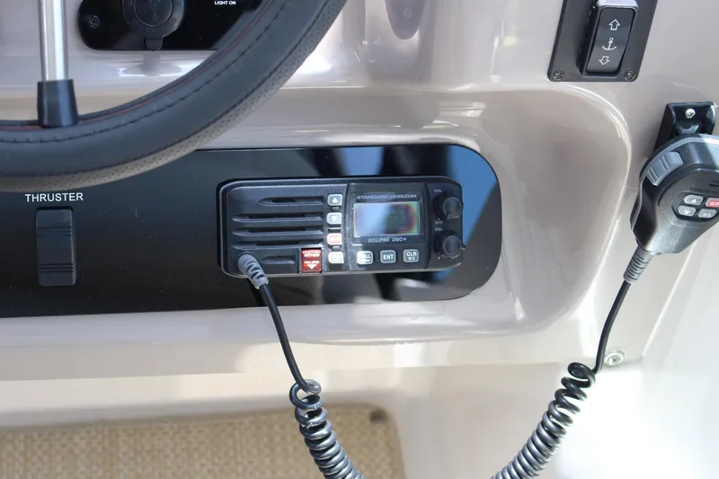 Happy Ours Yacht Photos Pics Control panel of 2008 Chaparral 350 Signature boat with radio and thruster controls.