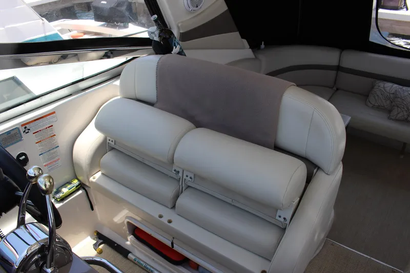 Happy Ours Yacht Photos Pics 2008 Chaparral 350 Signature boat interior with plush seating and modern controls.