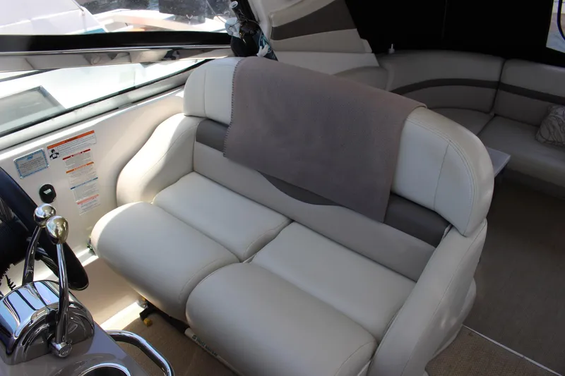 Happy Ours Yacht Photos Pics 2008 Chaparral 350 Signature Extended Plane interior with plush seating and modern controls.