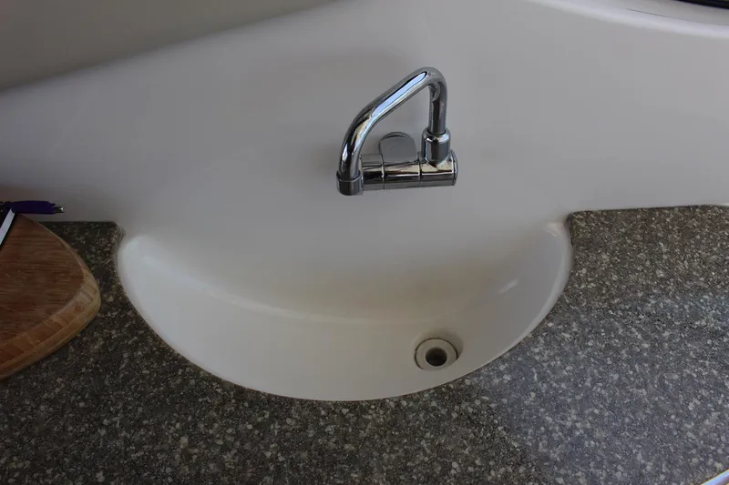 Happy Ours Yacht Photos Pics Sink with chrome faucet on Chaparral 350 Signature Extended Plane, 2008 model.