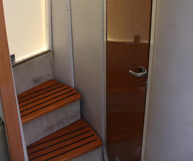 Happy Ours Yacht Photos Pics Interior stairs of 2008 Chaparral 350 Signature Extended Plane yacht.