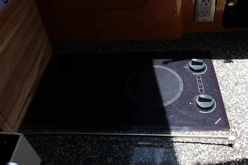 Happy Ours Yacht Photos Pics Stovetop in 2008 Chaparral 350 Signature Extended Plane kitchen area.