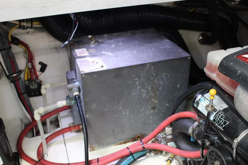 Happy Ours Yacht Photos Pics Engine compartment of 2008 Chaparral 350 Signature Extended Plane with visible wiring and components.