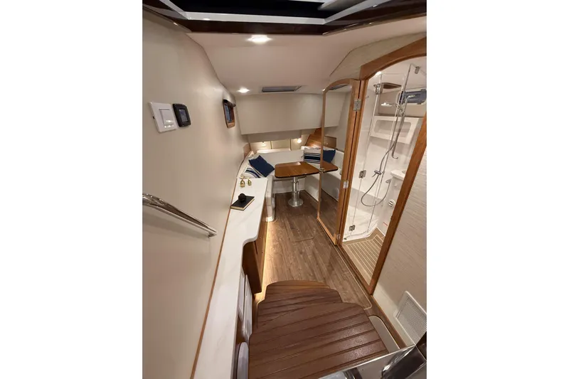 In Stock Yacht Photos Pics Luxurious interior of 2026 MJM 47X yacht featuring elegant wood finishes and modern amenities.